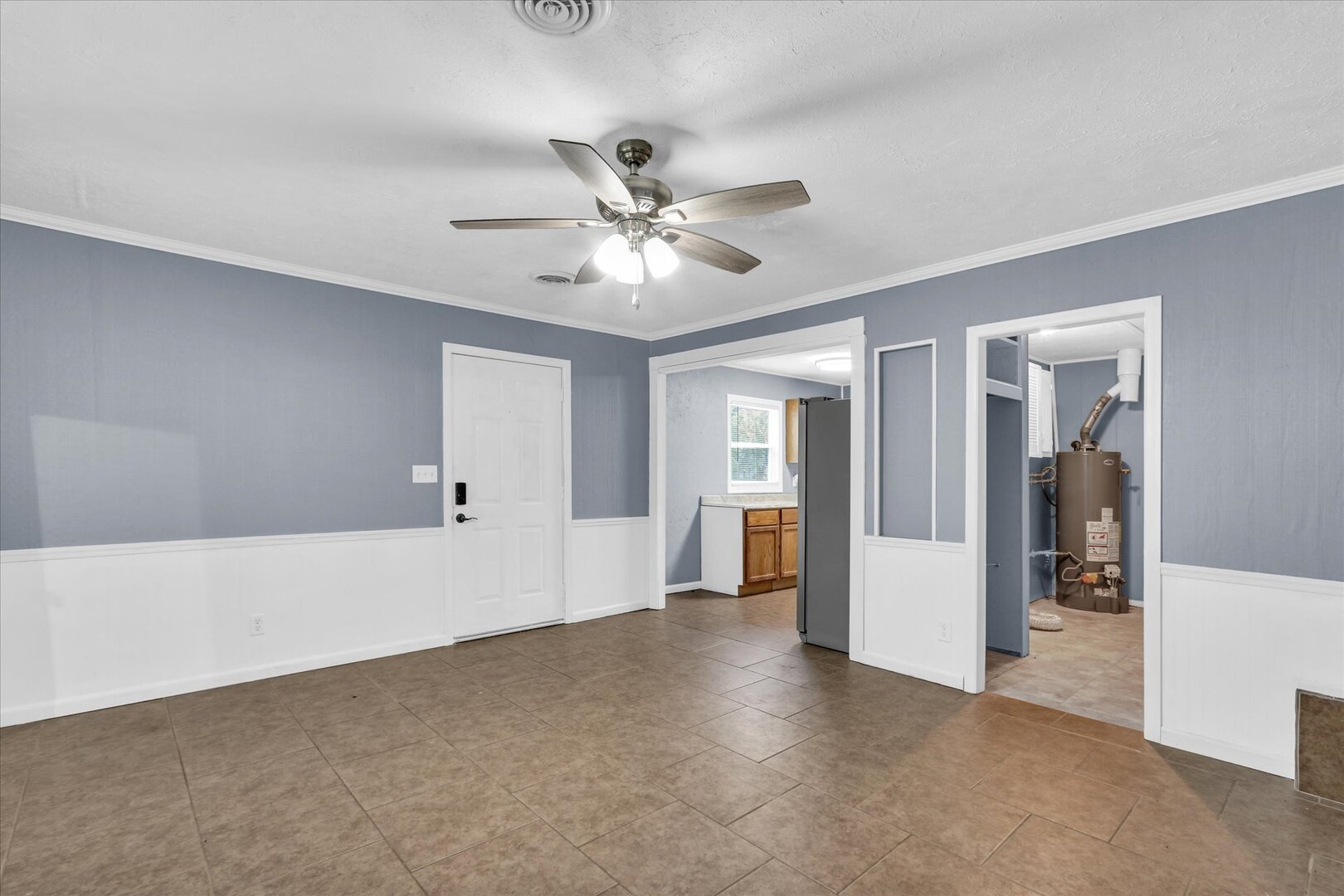 817 Roselyn Drive Rantoul, IL 61866 - Photo 14 of 33 a view of a big room with closet and windows