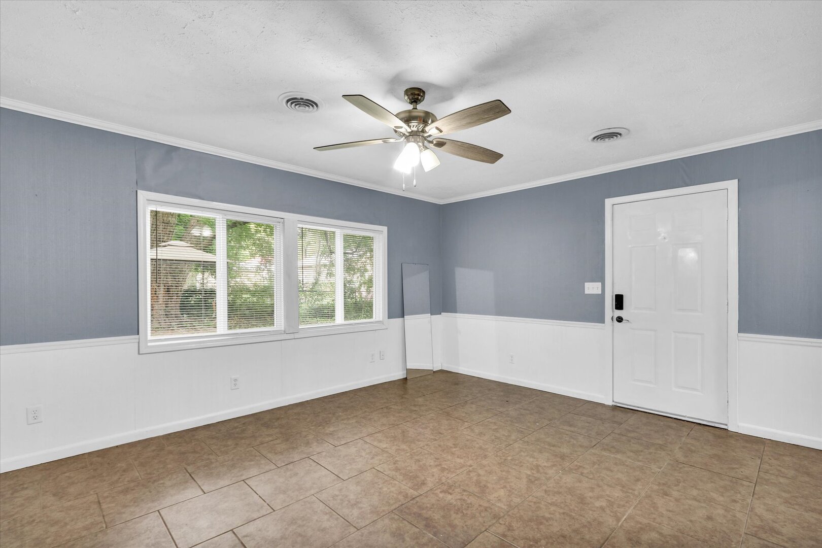 817 Roselyn Drive Rantoul, IL 61866 - Photo 15 of 33 a view of an empty room with a window