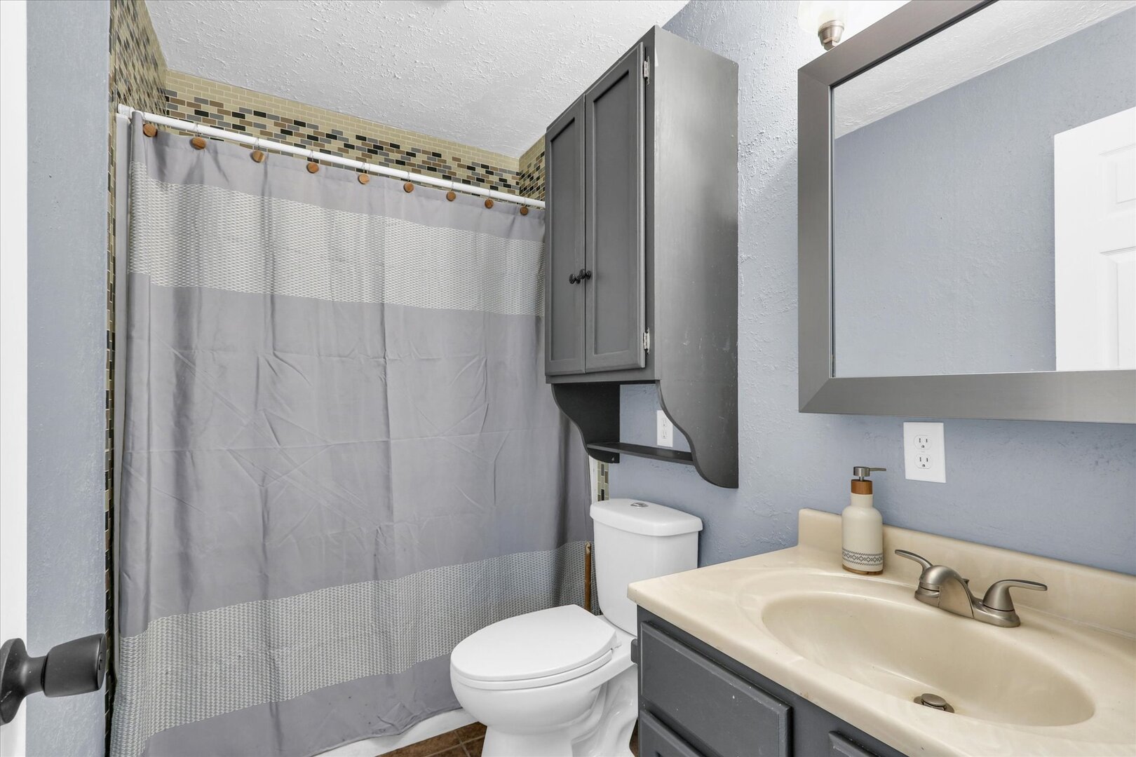 817 Roselyn Drive Rantoul, IL 61866 - Photo 23 of 33 a bathroom with a sink toilet and shower