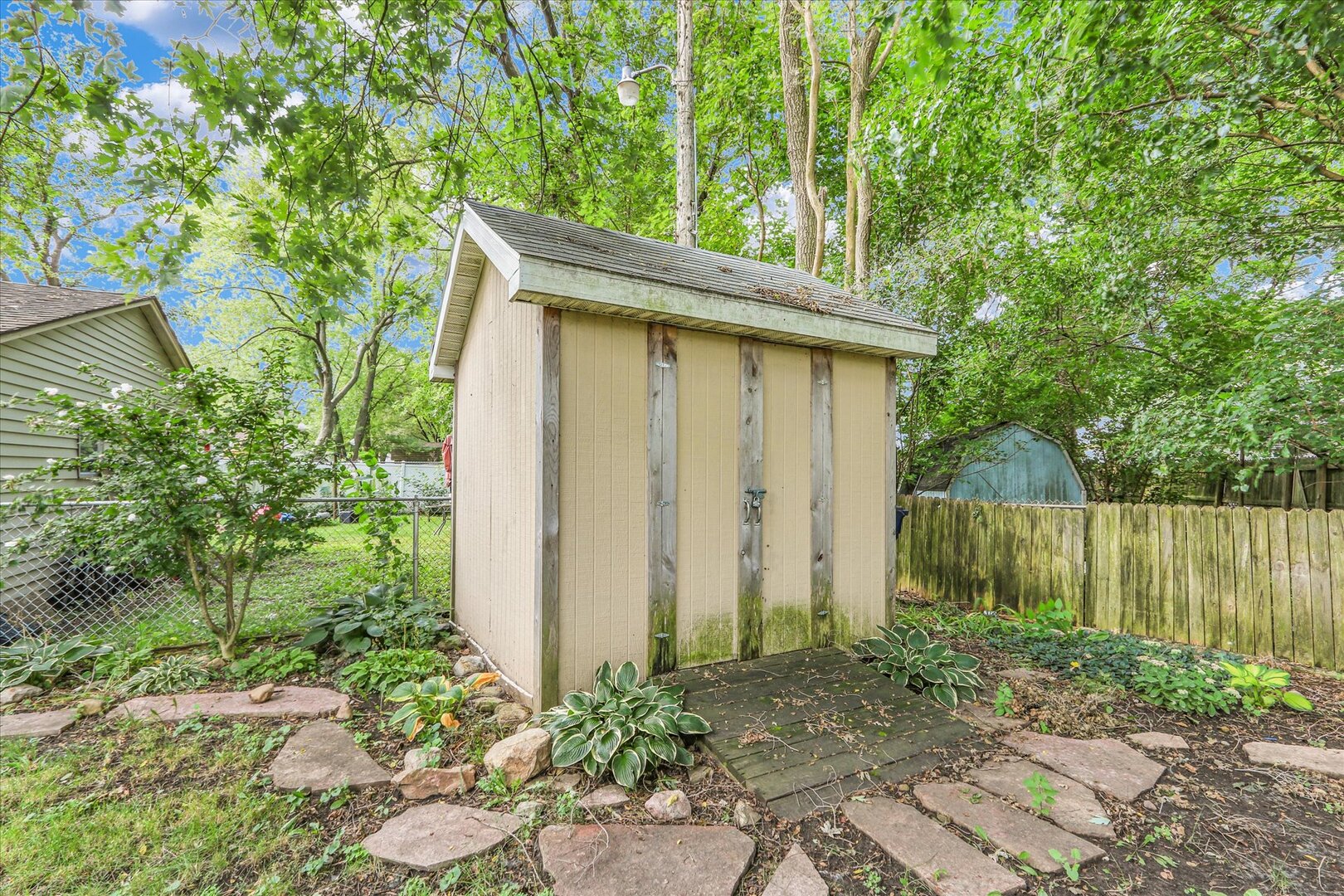 817 Roselyn Drive Rantoul, IL 61866 - Photo 27 of 33 a view of a house with a yard
