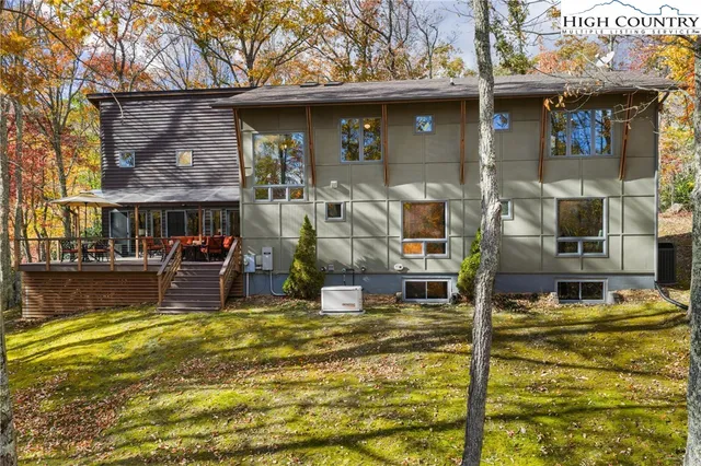 a view of swimming pool with outdoor seating