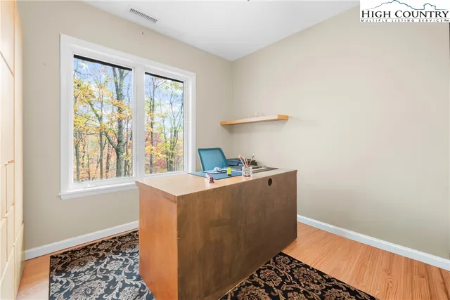a kitchen with a sink a refrigerator and a stove