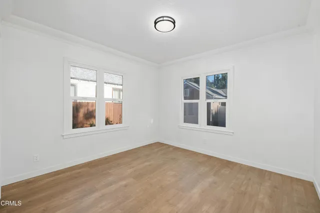 an empty room with windows