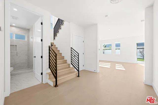 a view of an entryway with staircase