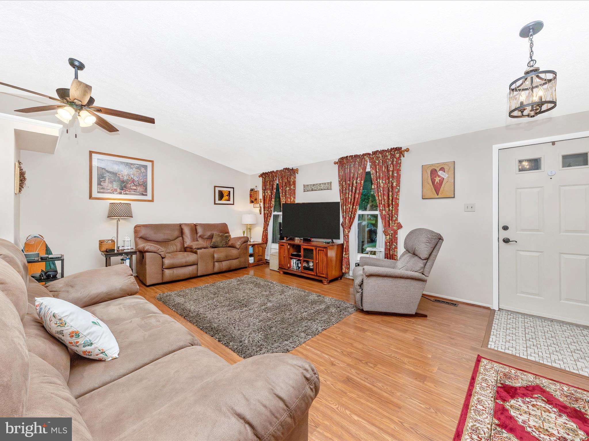 5903 Char Leigh Circle Frederick, MD 21703 - Photo 19 of 62 a living room with furniture and a couch