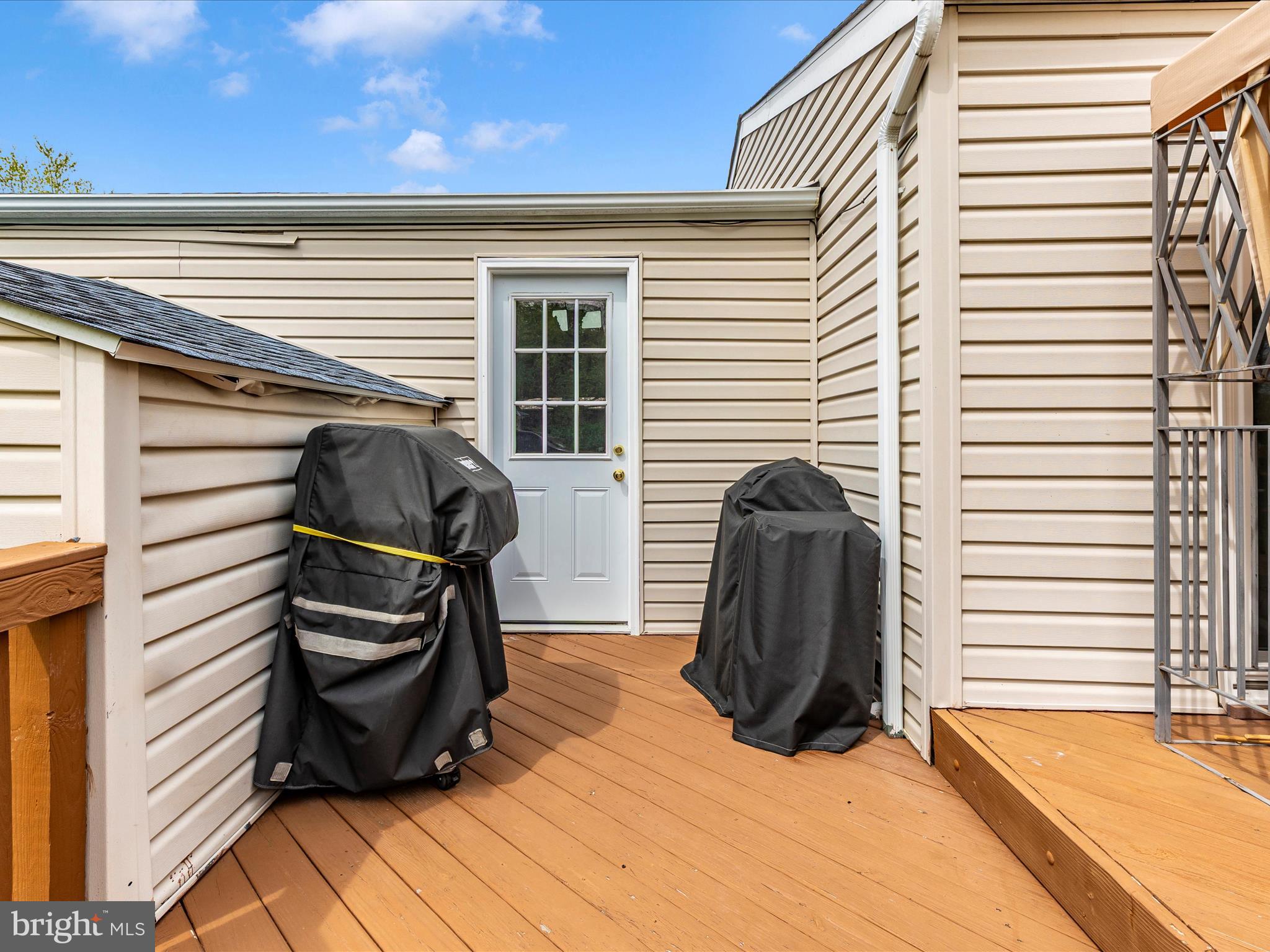 5903 Char Leigh Circle Frederick, MD 21703 - Photo 61 of 62 a view of a patio with a table and chairs and potted plants