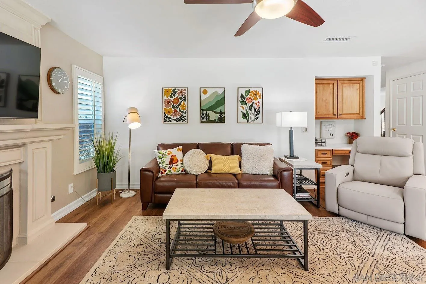 14922 Derringer Road Poway, CA 92064 - Photo 12 of 66 a bedroom with a bed a couch and a chandelier