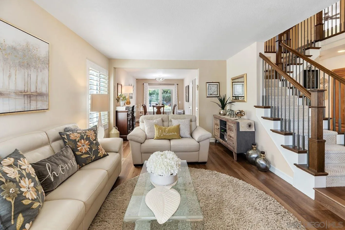 14922 Derringer Road Poway, CA 92064 - Photo 13 of 66 a living room with furniture fireplace and a window