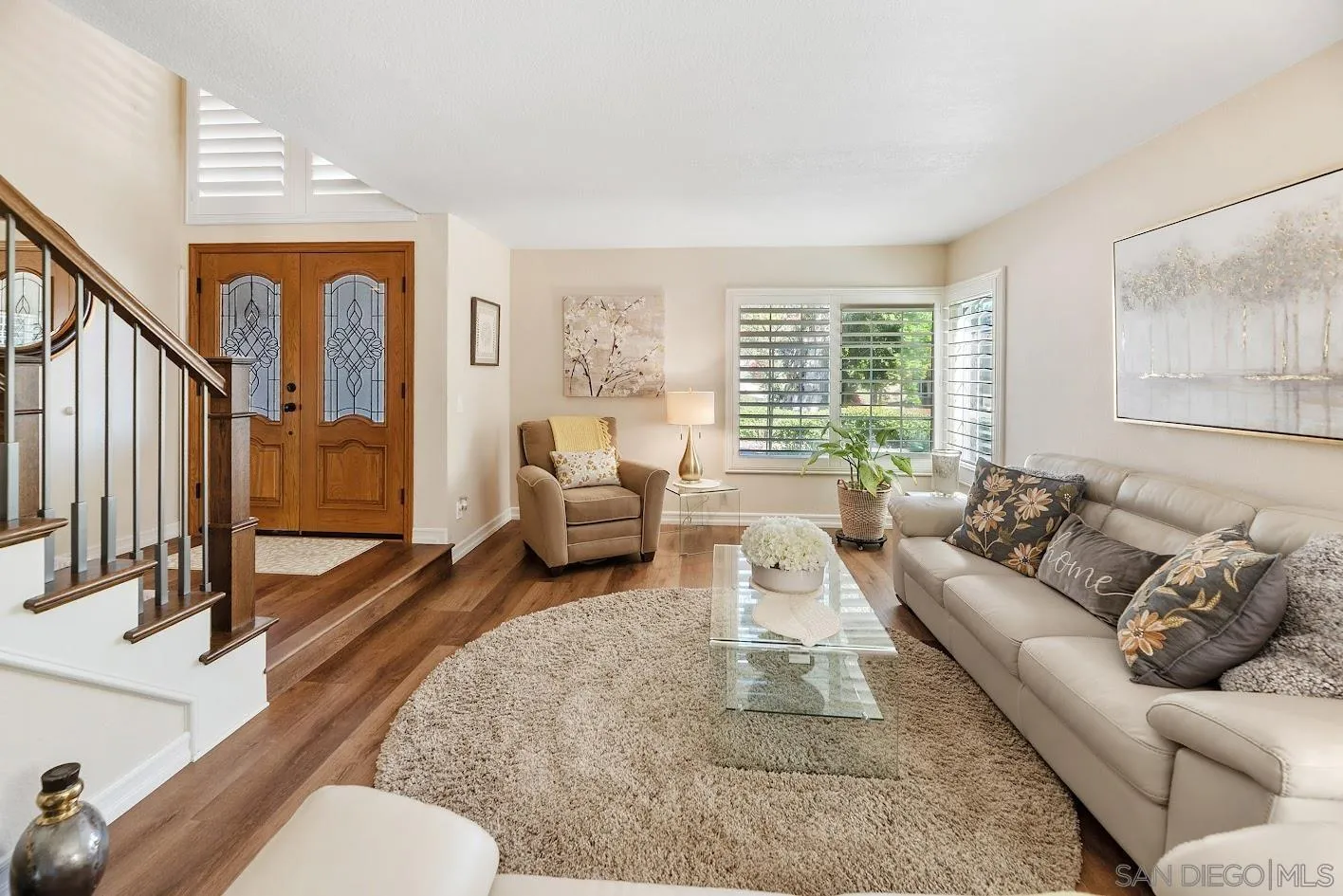 14922 Derringer Road Poway, CA 92064 - Photo 14 of 66 a living room with furniture and a large window