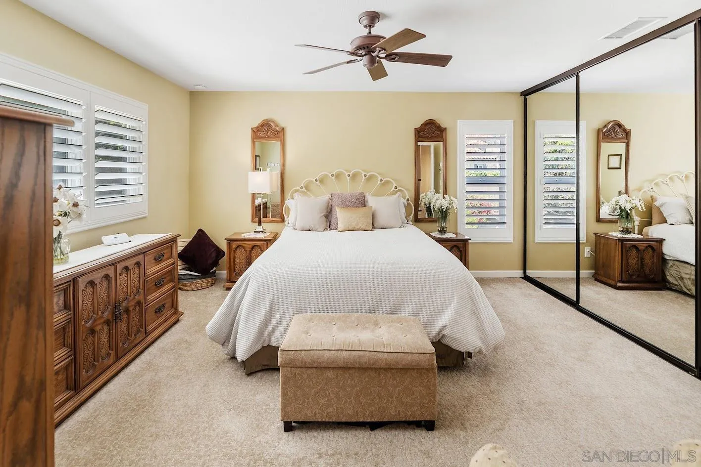14922 Derringer Road Poway, CA 92064 - Photo 20 of 66 a spacious bedroom with a bed and large window