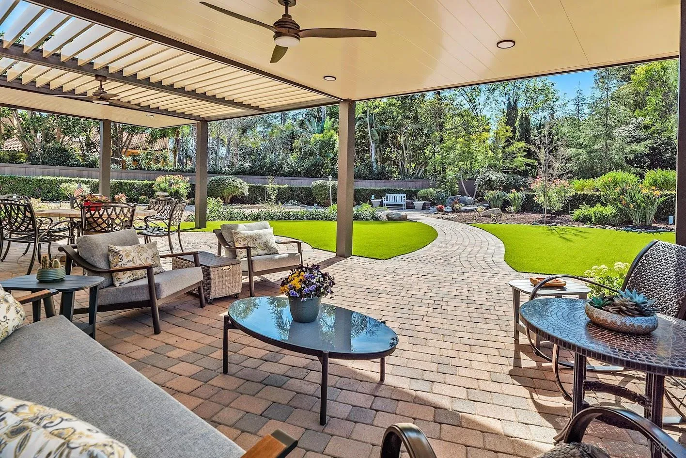 14922 Derringer Road Poway, CA 92064 - Photo 2 of 66 a view of a backyard with swimming pool and furniture