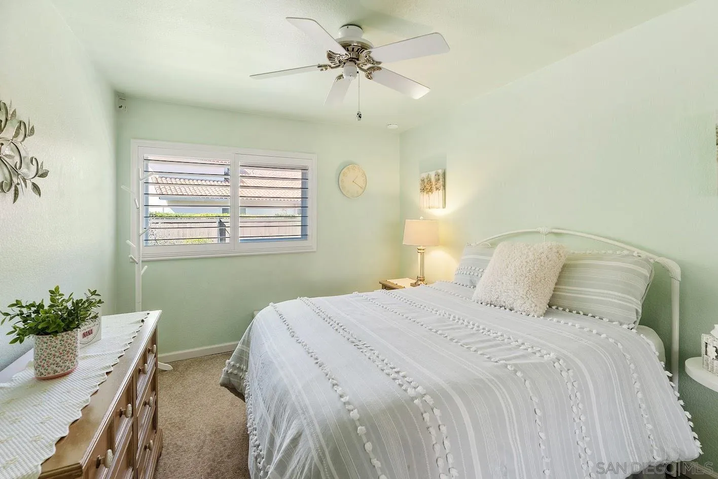 14922 Derringer Road Poway, CA 92064 - Photo 26 of 66 a bedroom with a bed table and a window