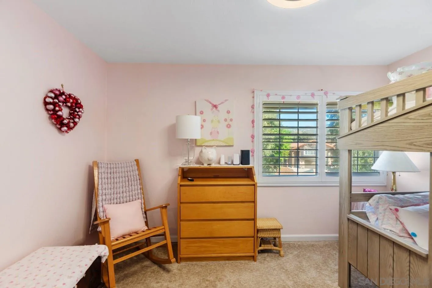 14922 Derringer Road Poway, CA 92064 - Photo 28 of 66 a bedroom with a bed and a window