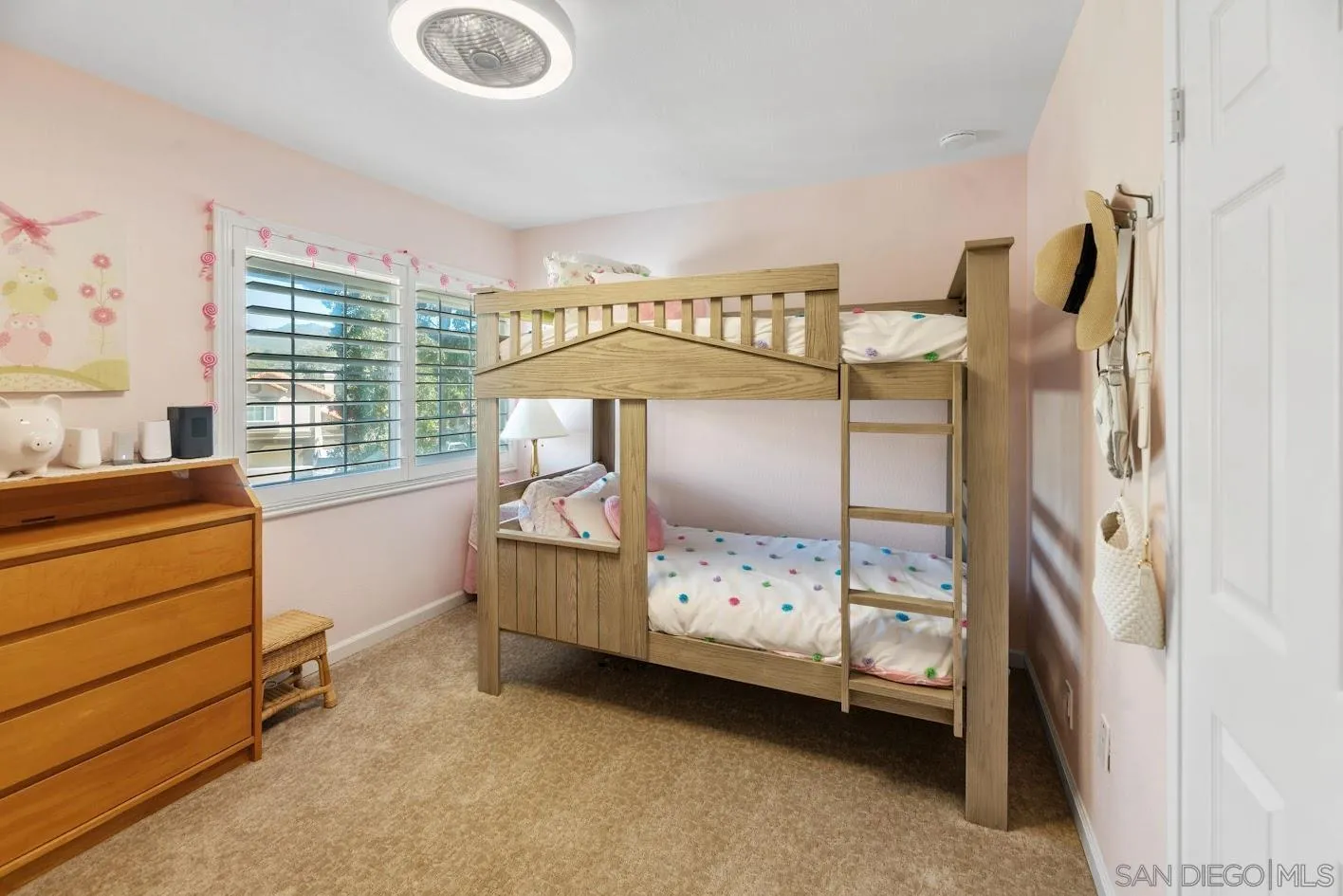 14922 Derringer Road Poway, CA 92064 - Photo 30 of 66 a bedroom with a bed and a window