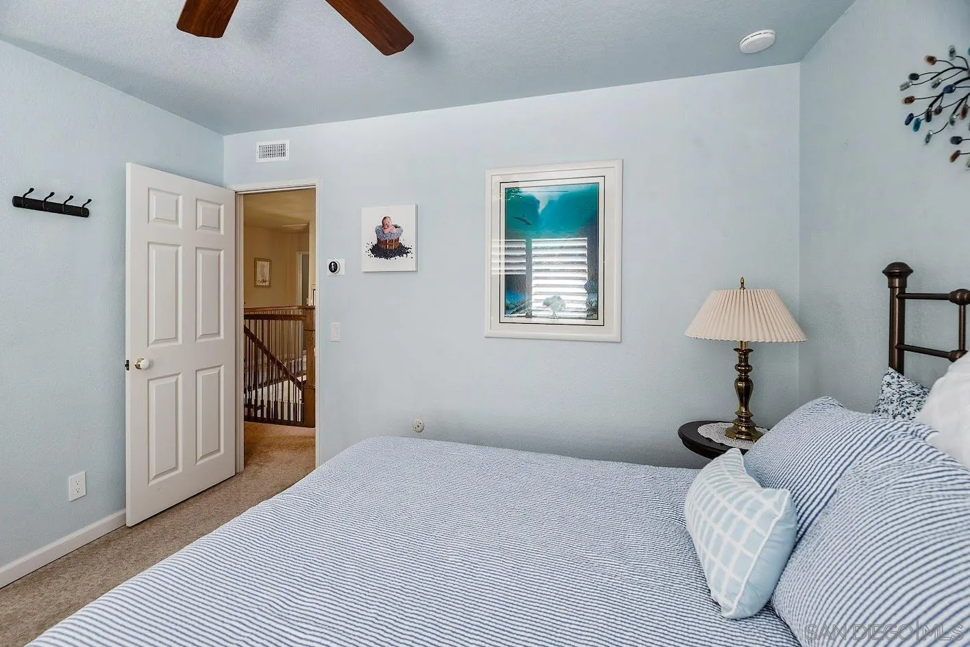 14922 Derringer Road Poway, CA 92064 - Photo 33 of 66 a bedroom with a bed and a window