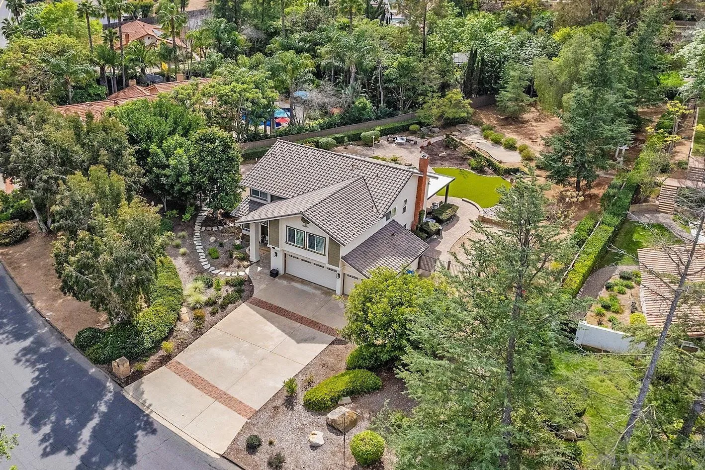 14922 Derringer Road Poway, CA 92064 - Photo 55 of 66 an aerial view of a house with a swimming pool