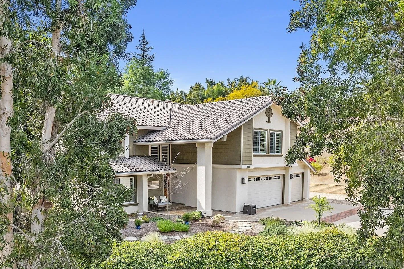 14922 Derringer Road Poway, CA 92064 - Photo 62 of 66 a house that has a tree in front of the house