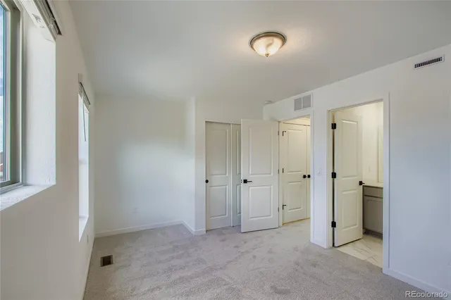 a front view of a building with street view