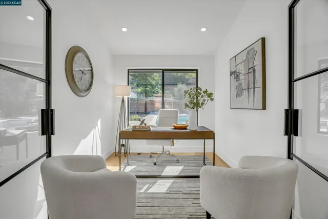 a view of a storage & utility room with two washing machine