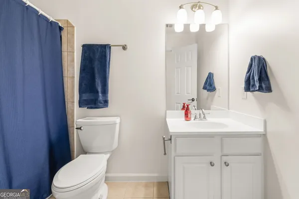 an aerial view of a house with a swimming pool
