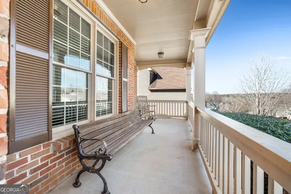 a view of a livingroom with furniture and hardwood floor