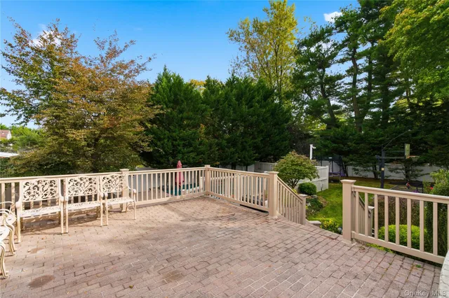 a view of deck with a trees