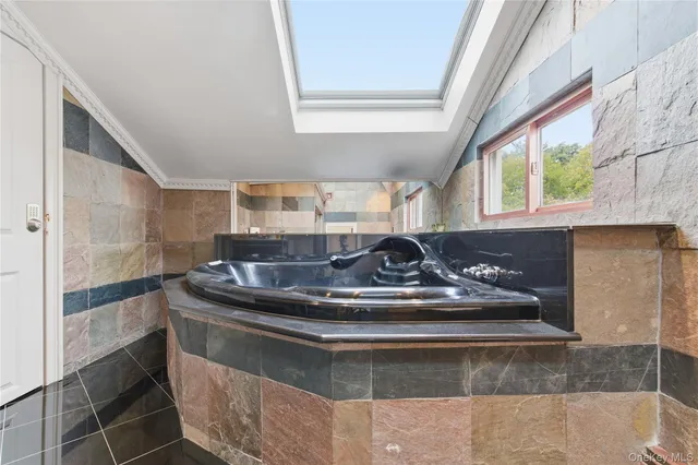 a view of fireplace and window