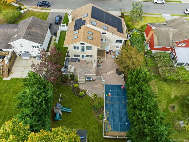 a outdoor space with the couches and a potted plant