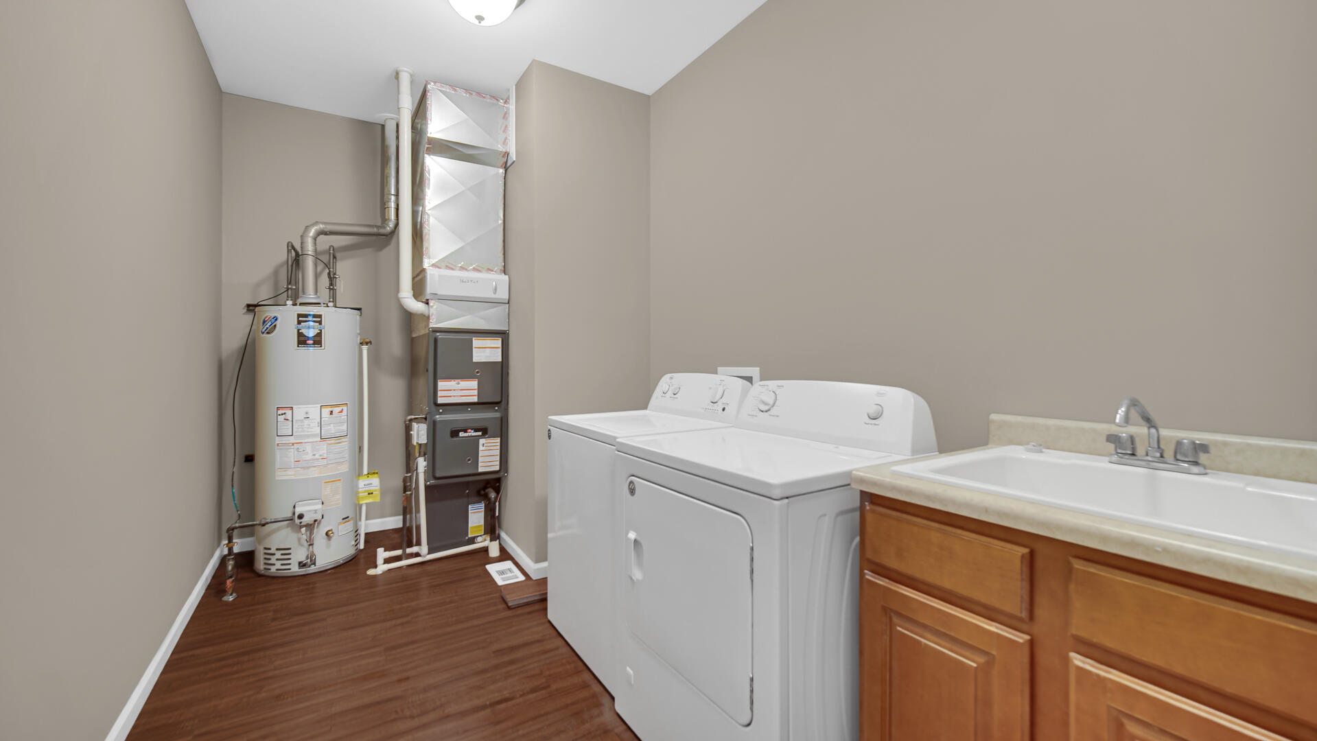 3889-91 Stadium Street Portage, IN 46368 - Photo 12 of 23 a utility room with dryer and washer