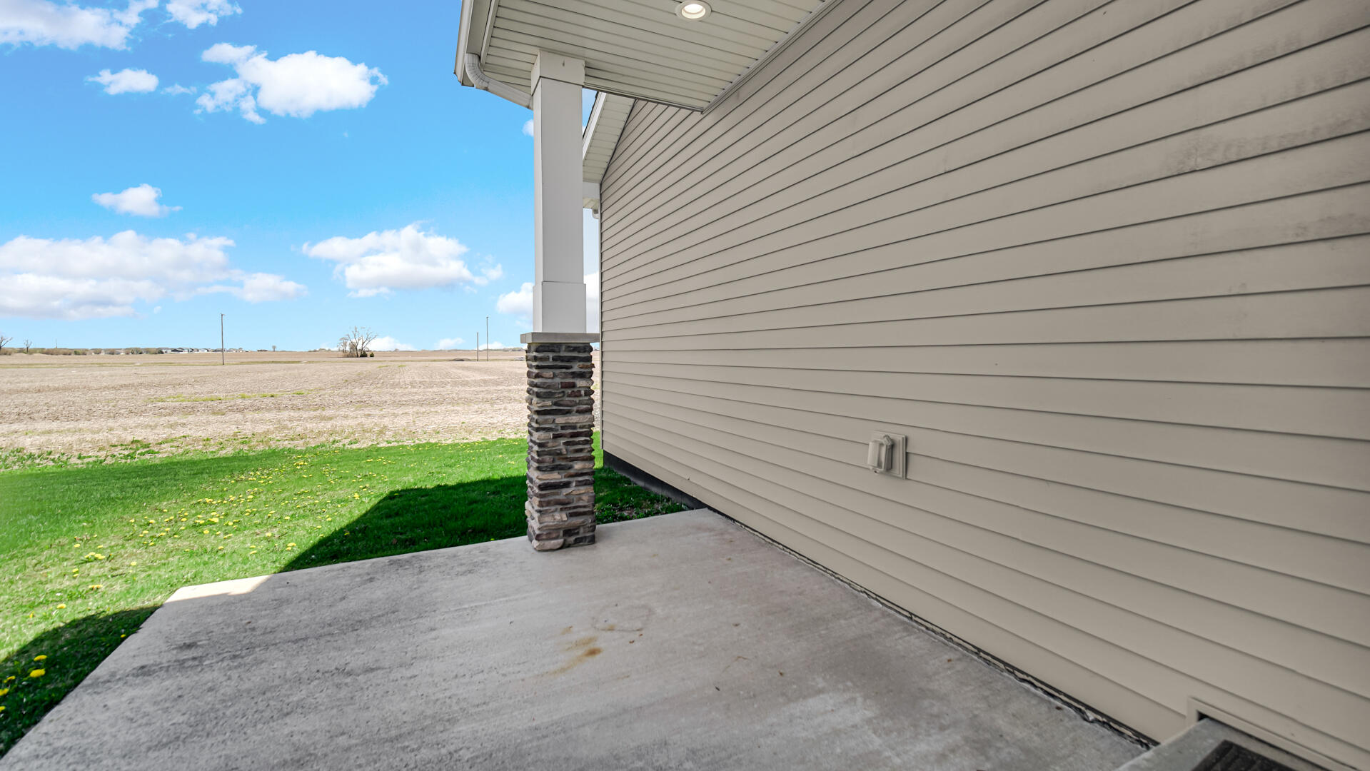 3889-91 Stadium Street Portage, IN 46368 - Photo 19 of 23 a view of a terrace with a garden