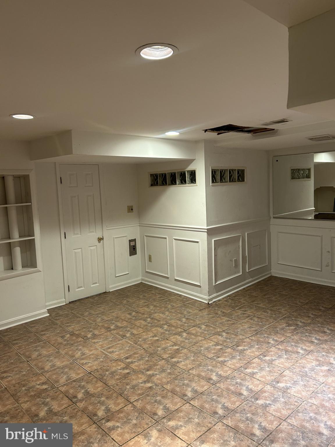11309 Veirs Mill Road Silver Spring, MD 20902 - Photo 12 of 17 Basement rec room