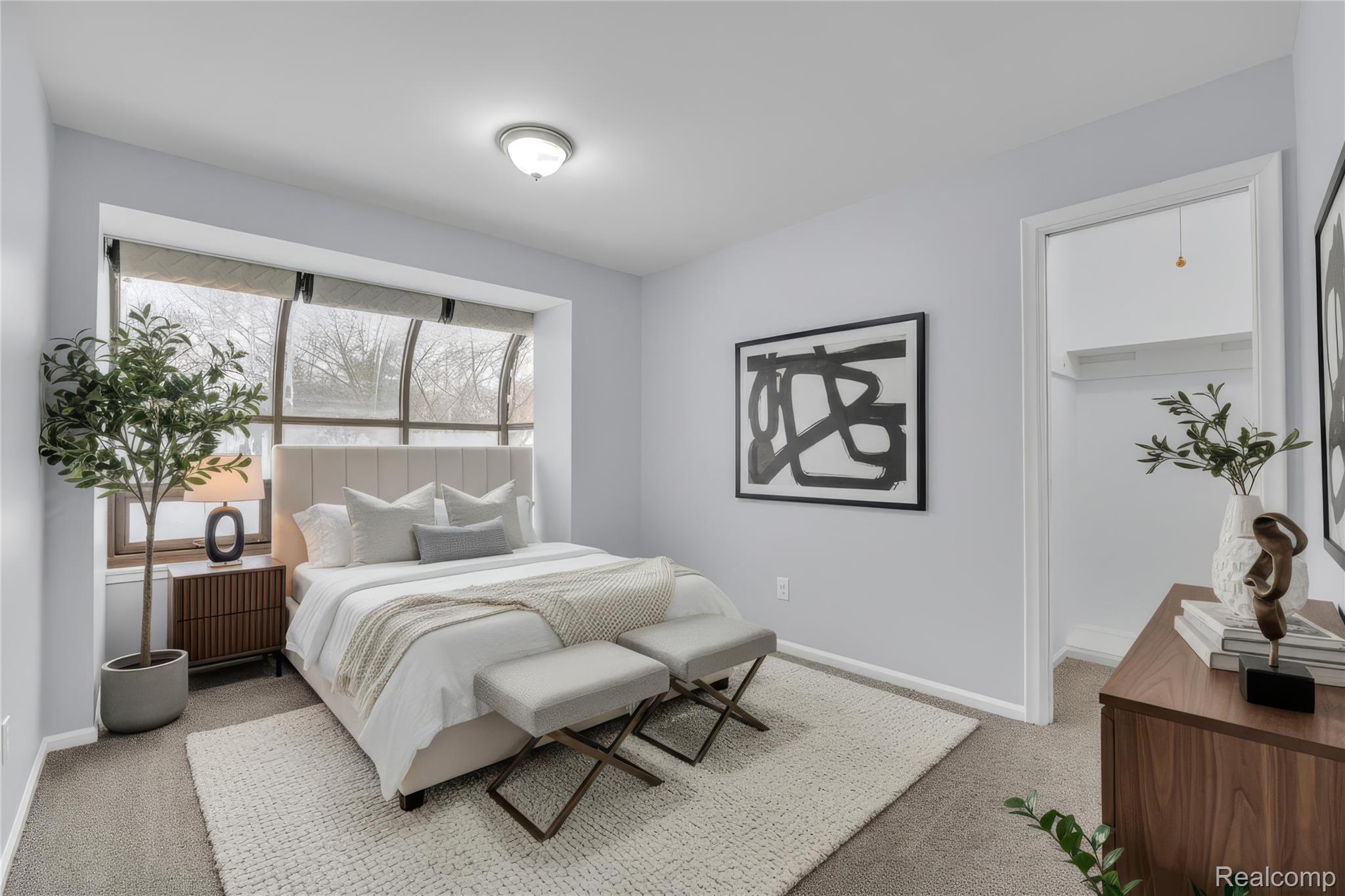 6576 Inkster Road West Bloomfield, MI 48322 - Photo 7 of 62 Bedroom with light colored carpet and baseboards