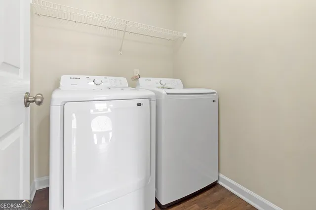 a utility room with dryer and washer