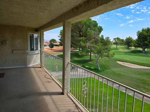 a view of a golf course with a garden