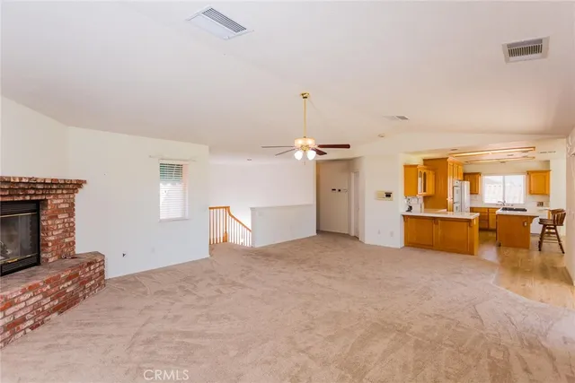 a kitchen that has a table and chairs in it