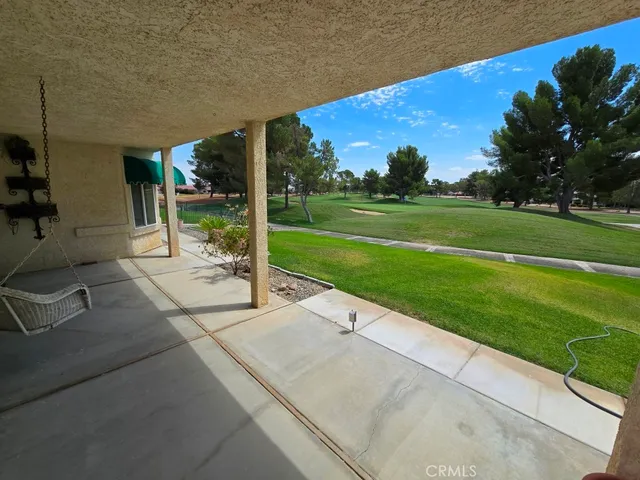 a view of a golf course with a garden