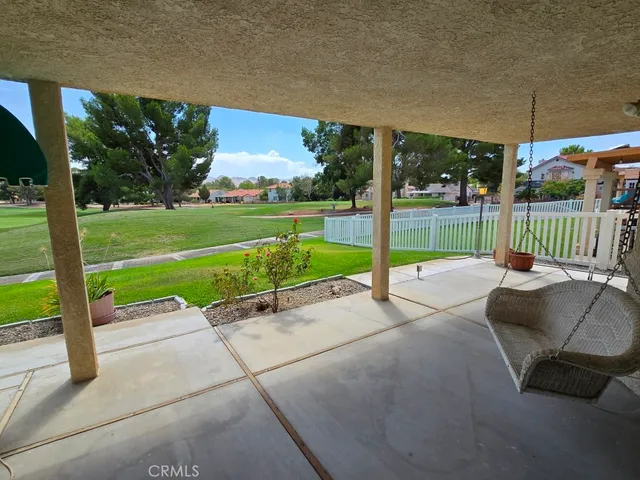 a view of a golf course with a lake