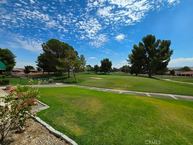a view of a house with a garden