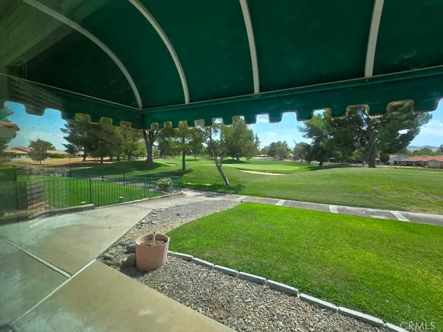 a view of a balcony with a garden