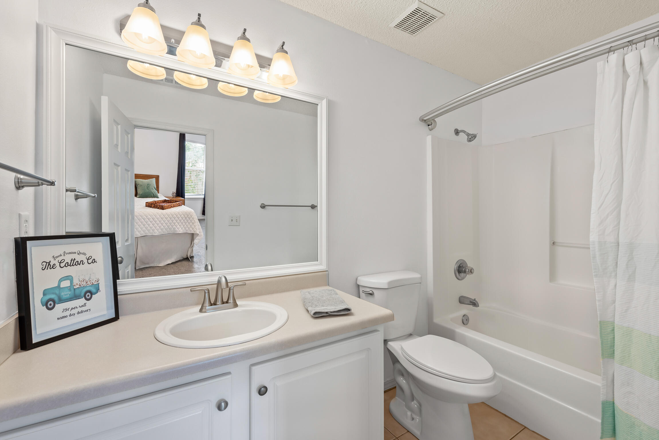 498 Keystone Road Mary Esther, FL 32569 - Photo 11 of 21 a bathroom with a toilet a sink and bathtub