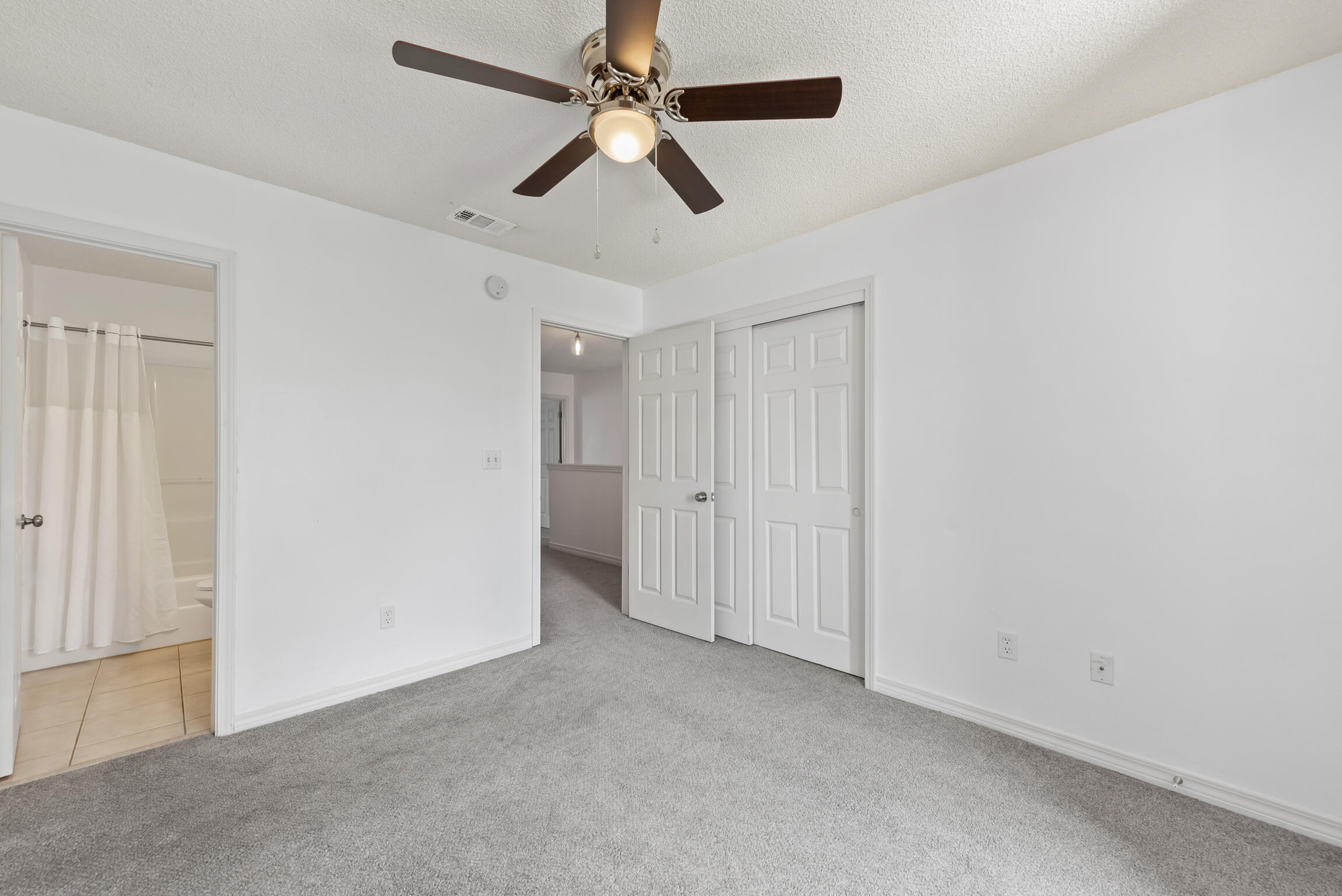 498 Keystone Road Mary Esther, FL 32569 - Photo 13 of 21 an empty room with chandelier fan