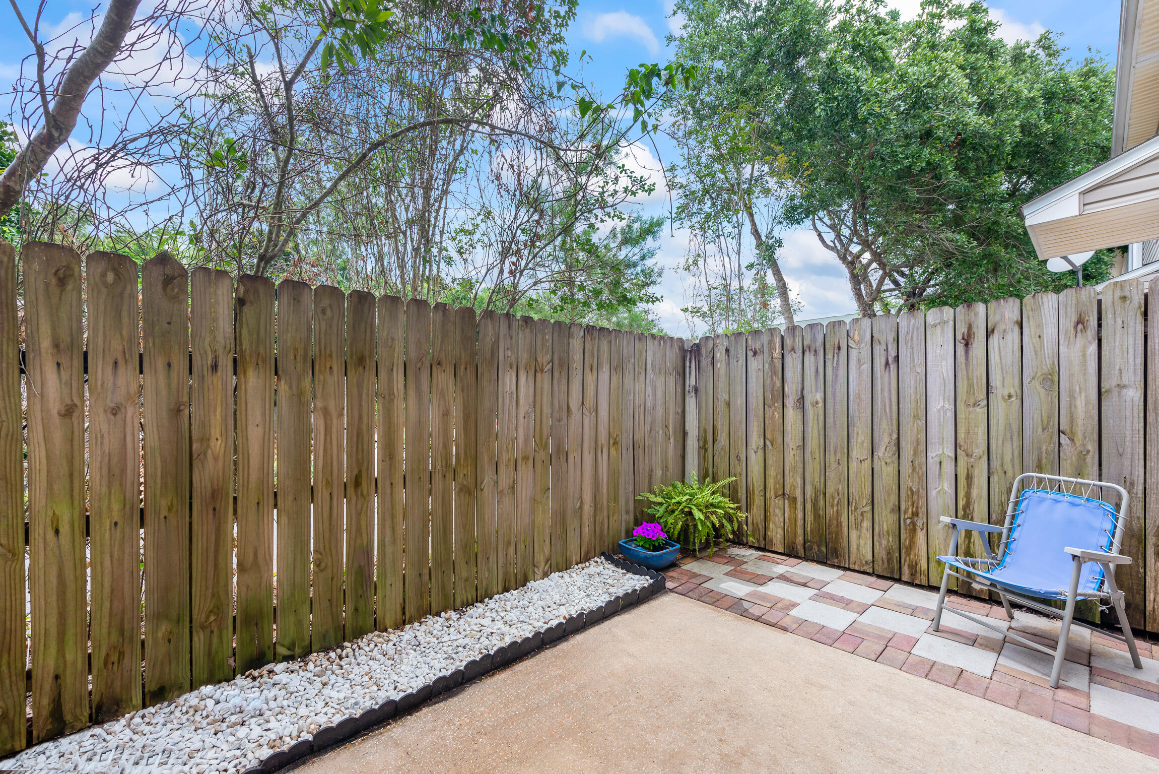 498 Keystone Road Mary Esther, FL 32569 - Photo 17 of 21 a view of two chairs with a wooden fence