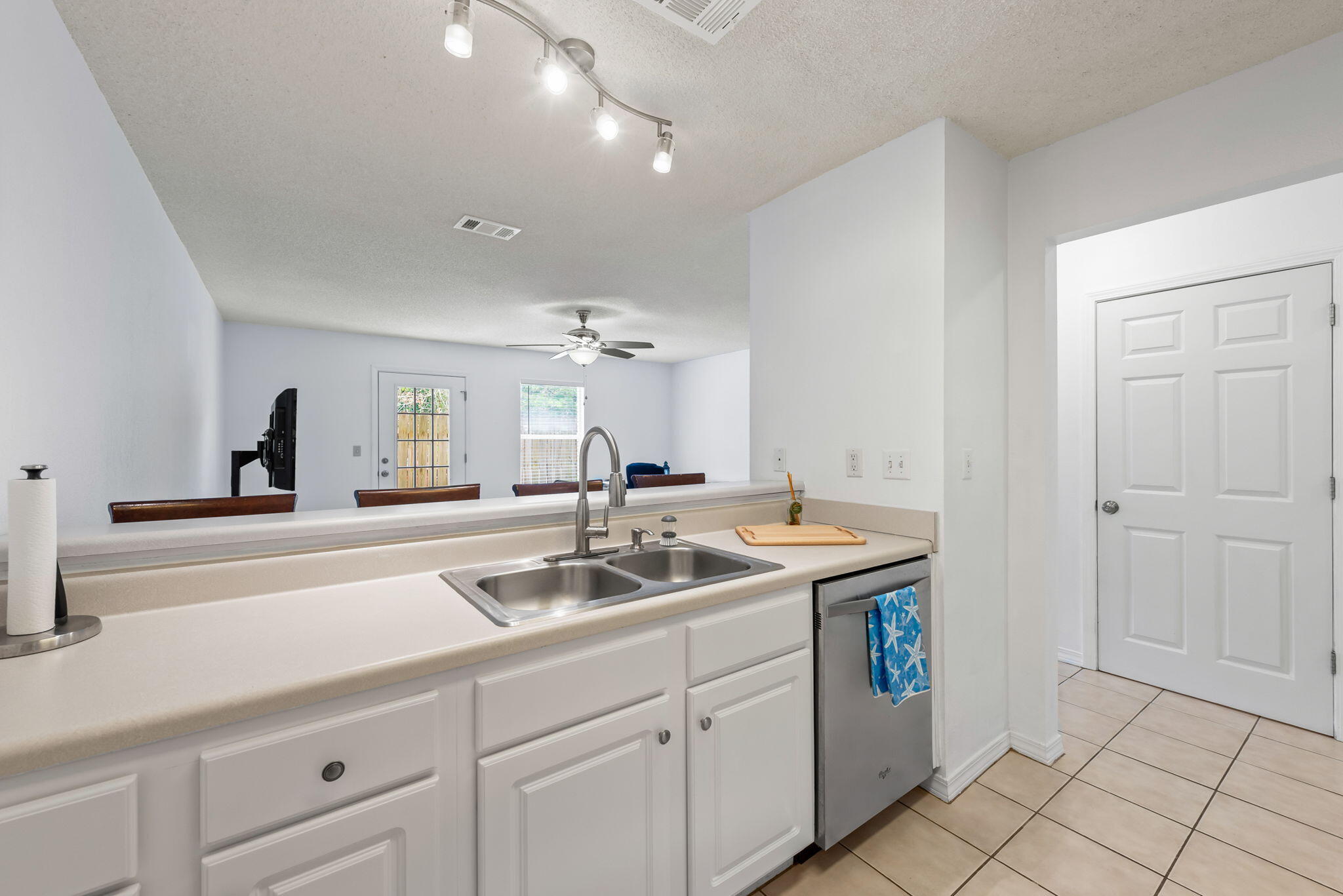 498 Keystone Road Mary Esther, FL 32569 - Photo 5 of 21 a kitchen with a sink and cabinets