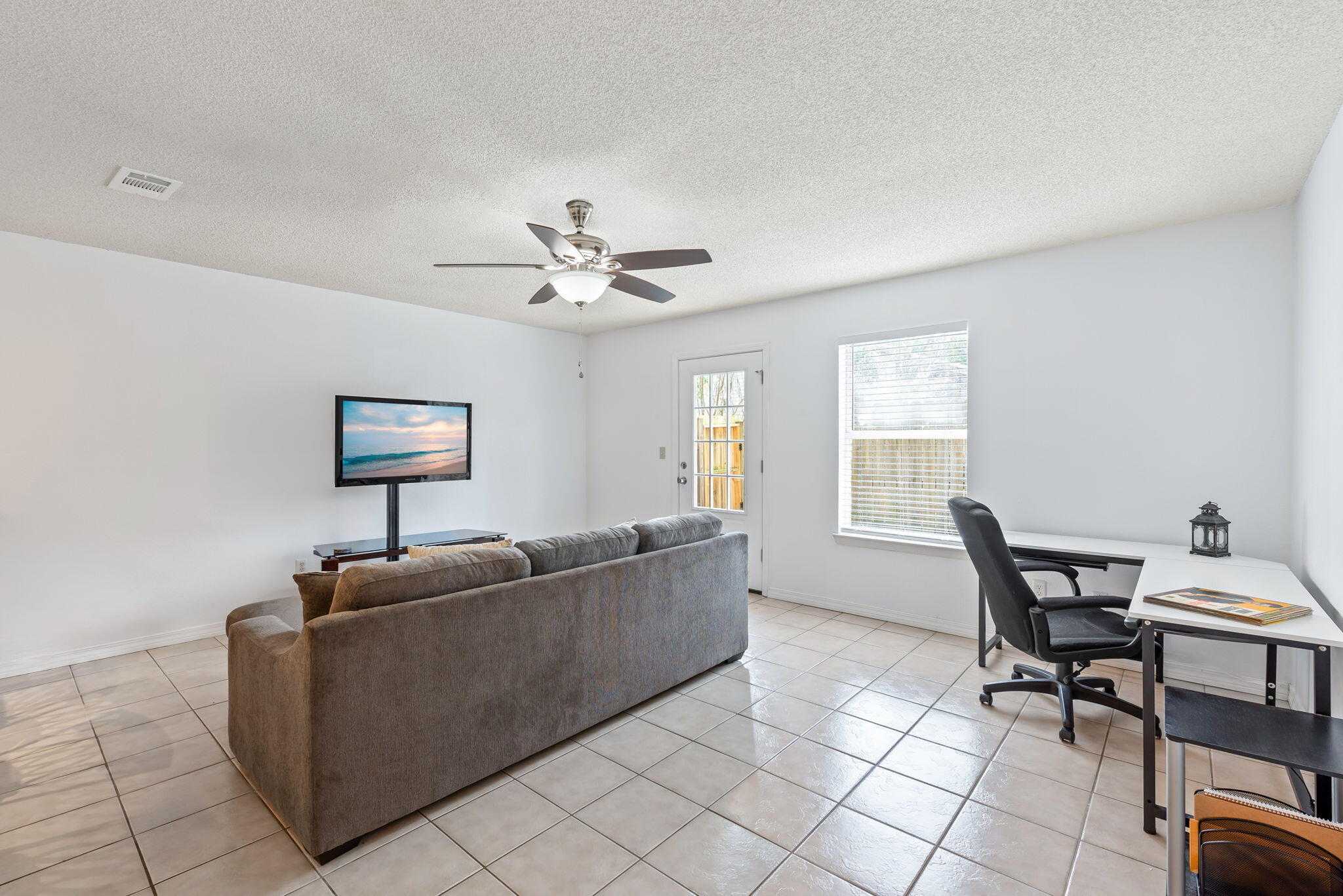 498 Keystone Road Mary Esther, FL 32569 - Photo 6 of 21 a living room with furniture and a window