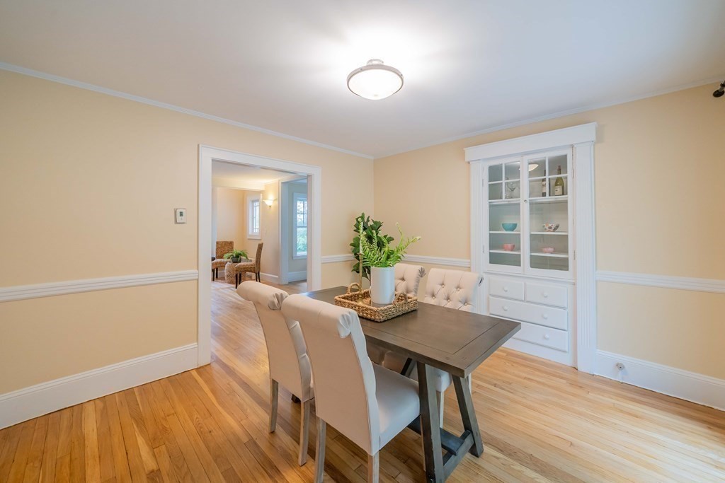 11 Wachusett Drive Lexington, MA 02421 - Photo 15 of 42 a view of a dining room with furniture and wooden floor