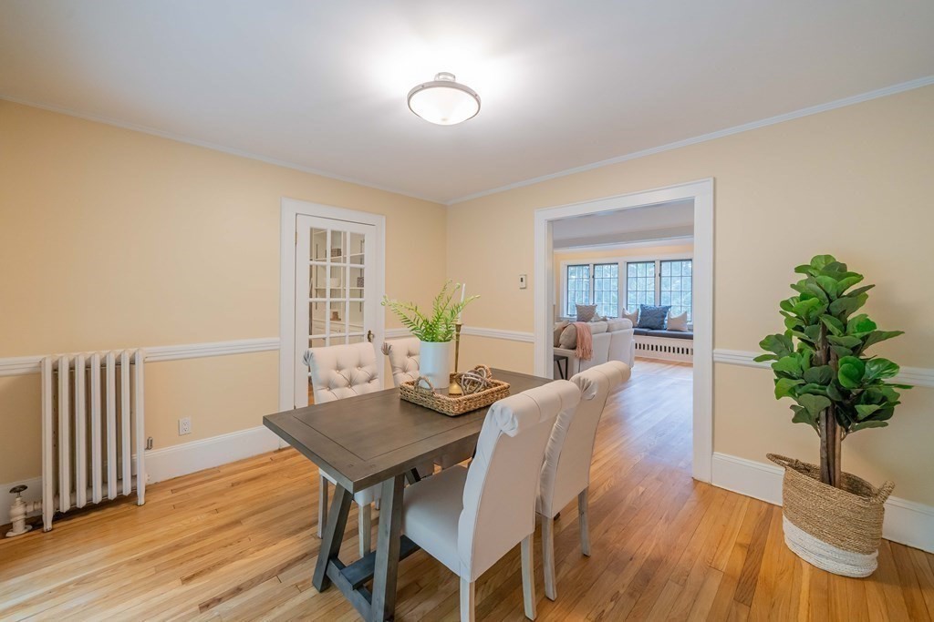 11 Wachusett Drive Lexington, MA 02421 - Photo 16 of 42 a view of a dining room with furniture window and wooden floor