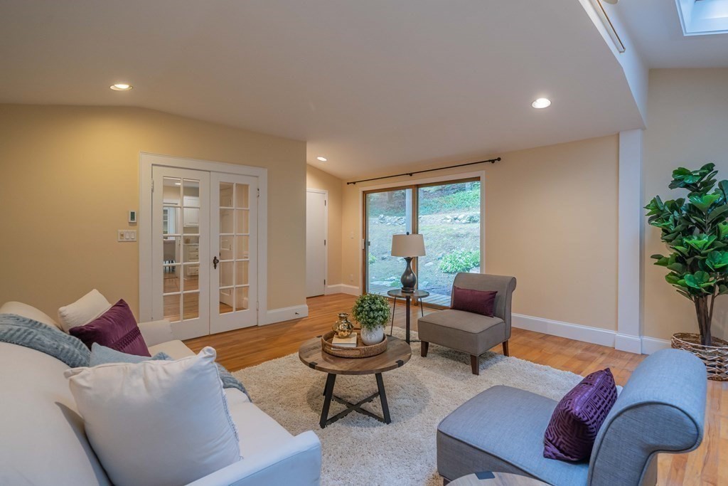 11 Wachusett Drive Lexington, MA 02421 - Photo 24 of 42 a living room with furniture and a large window