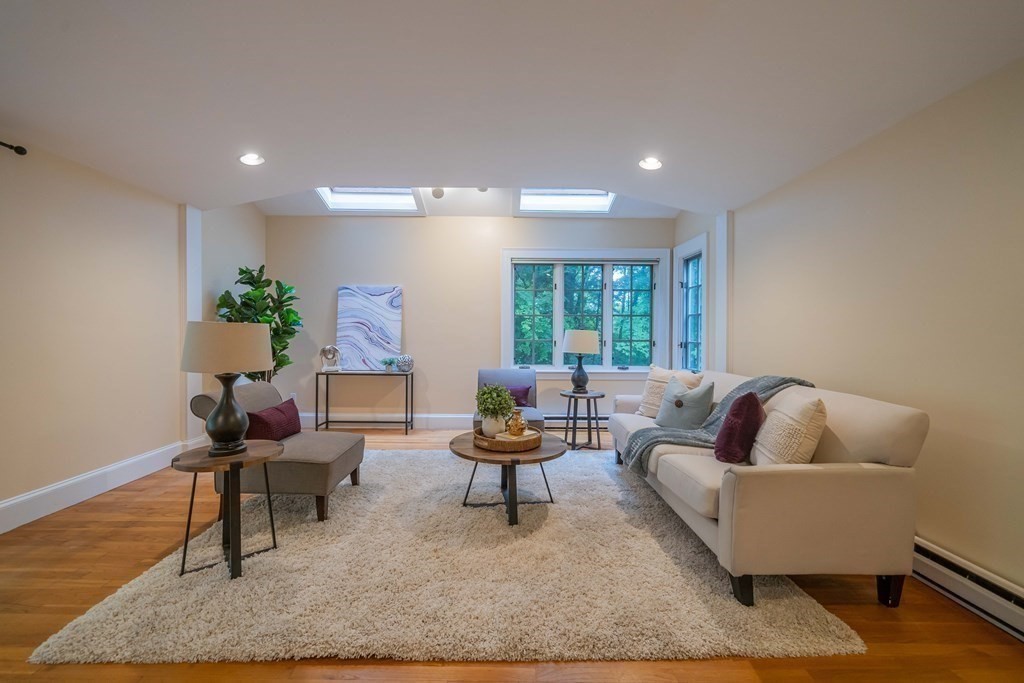 11 Wachusett Drive Lexington, MA 02421 - Photo 26 of 42 a living room with furniture and a couch