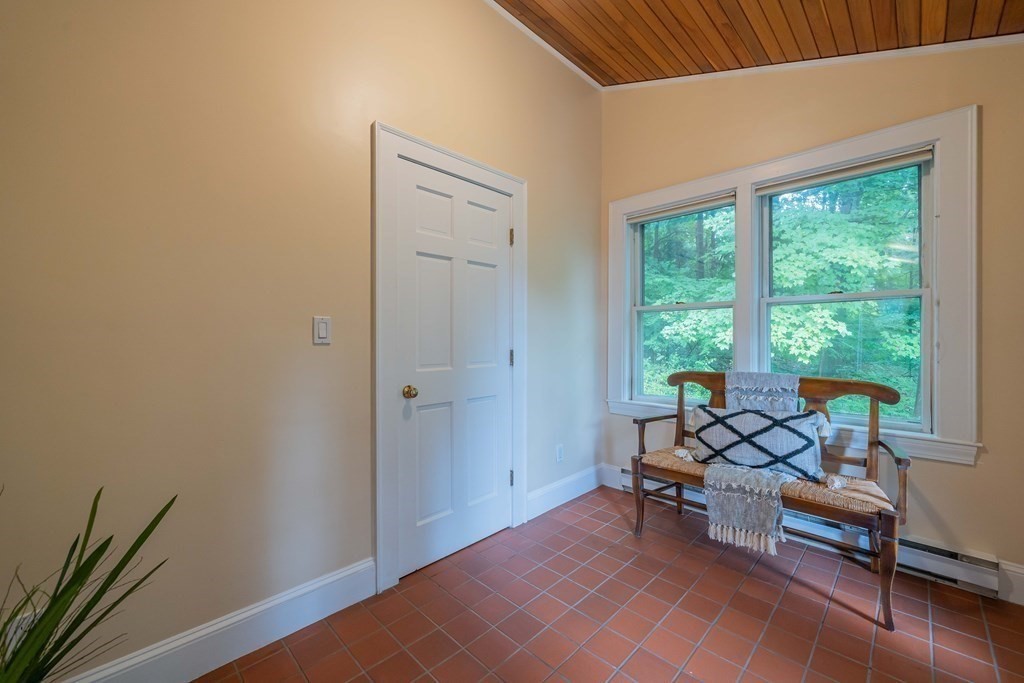 11 Wachusett Drive Lexington, MA 02421 - Photo 3 of 42 a living room with furniture and a window