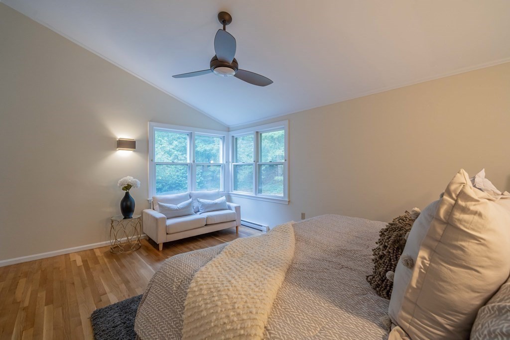 11 Wachusett Drive Lexington, MA 02421 - Photo 31 of 42 a bedroom with furniture and a large window